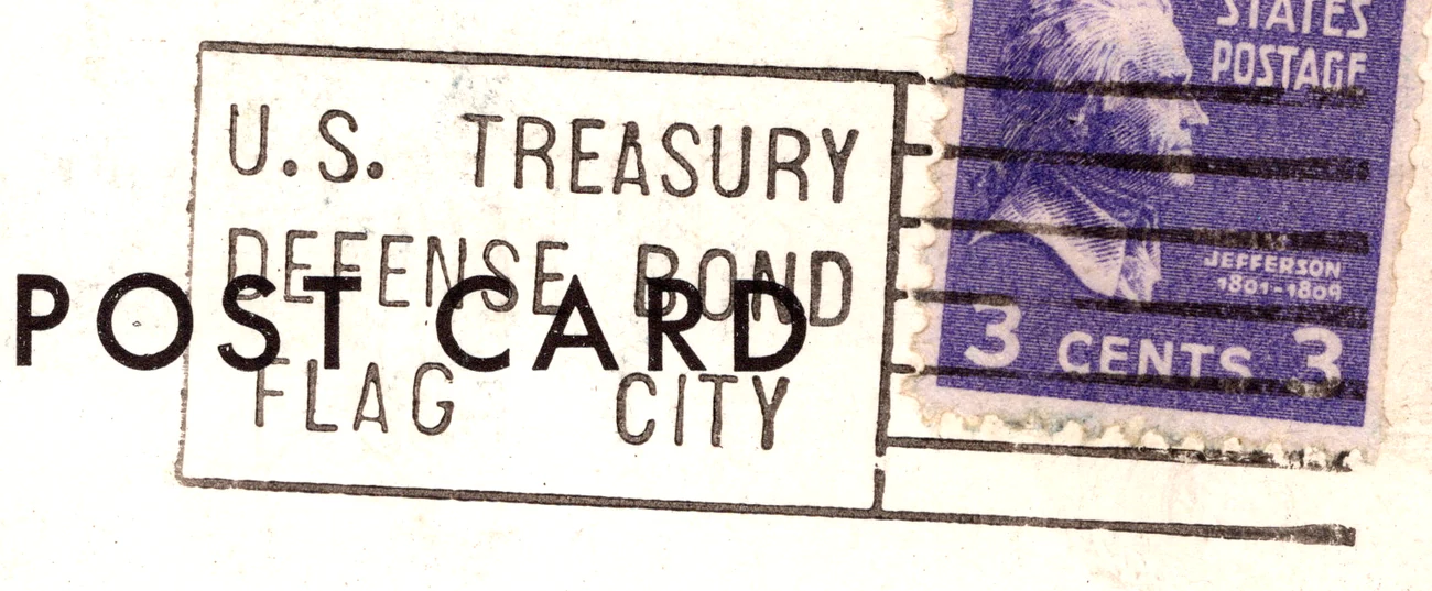 A machine slogan cancel with a waving flag promoting U.S. Treasury defense bonds, struck at Long Beach, California, 1953, from the Postcard Origins collection
