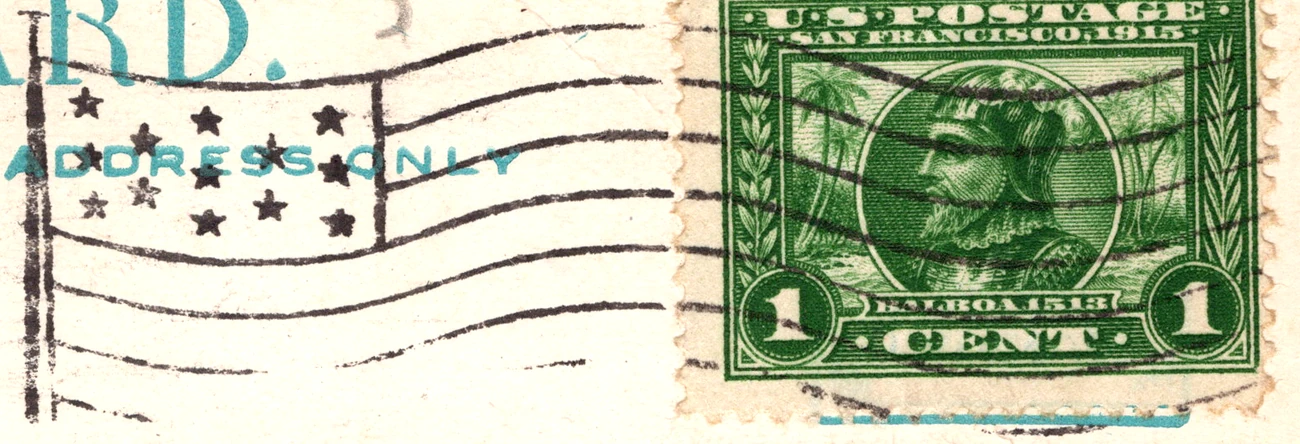 A flag-device cancel with stars and stripes beside a dated dial, postmarked 1914, from the Postcard Origins collection