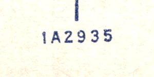A close-up of the printer's serial number on the back, reading 1A2935