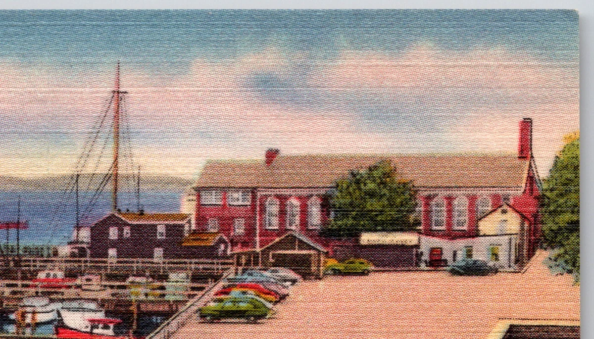A close-up of a linen-finish postcard surface from the Postcard Origins collection, showing the woven cloth-like texture pressed into the card stock