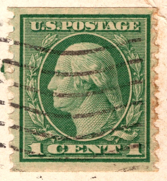 A 1-cent green George Washington stamp of the Washington-Franklin series, value in numerals, on a postcard, from the Postcard Origins collection