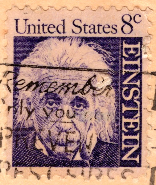 An 8-cent violet Albert Einstein stamp of the Prominent Americans series on a postcard, from the Postcard Origins collection